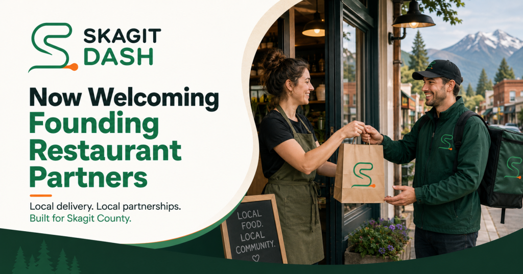 Skagit Dash delivery driver receiving an order from a local restaurant partner in Skagit County